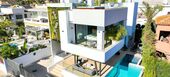 Elegante Villa a Pasos de la Playa en la Milla de Oro